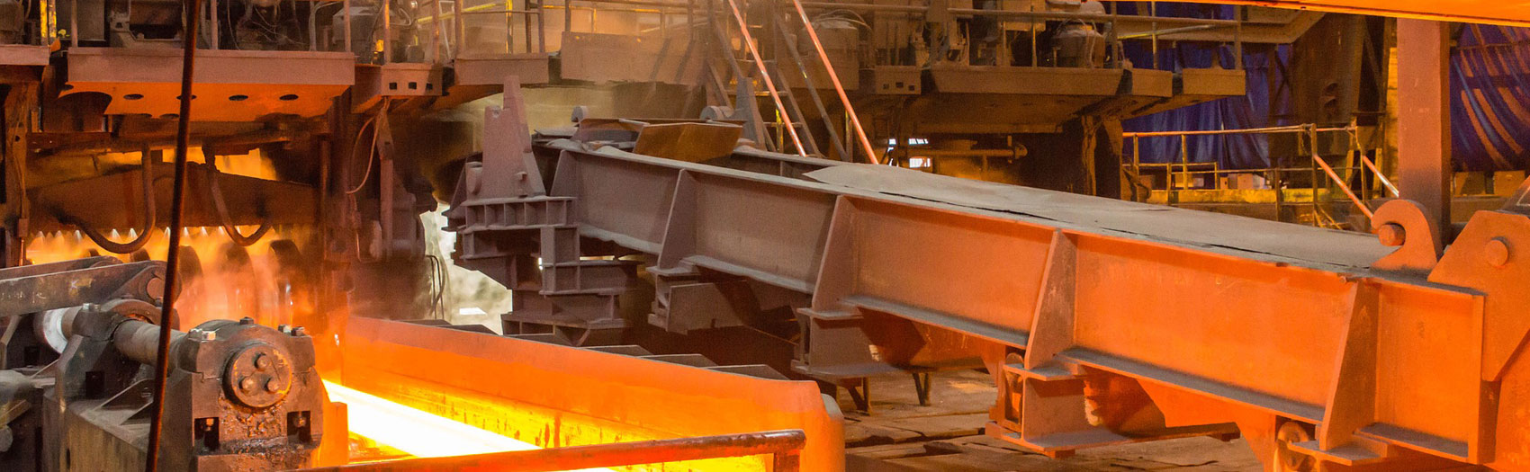 Hot steel moving through a steel mill