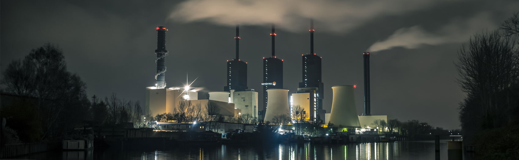 Power plant lit up at night