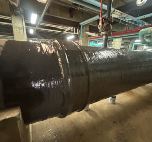 Corrosion protection coating applied to refurbished 48 inch pipe