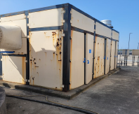 Corroded odor control enclosure before repair